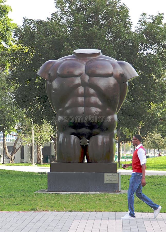 Miami, Florida - December 1, 2013: Male Torso by Gary Nadal, Bayfront Park, Miami, Florida. Miami, Florida - December 1, 2013: Male Torso by Gary Nadal, Bayfront Park, Miami, Florida